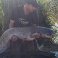 Craig with a cat caught on our Catfish Rigs